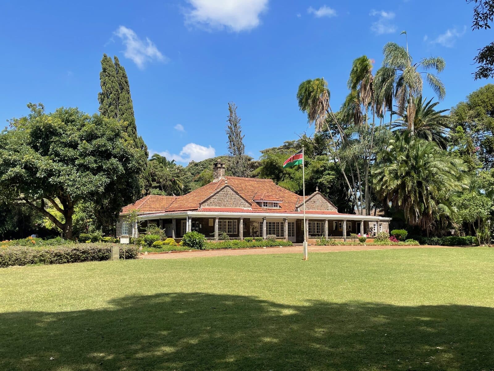Karen Blixen Museum house surrounded by a green garden